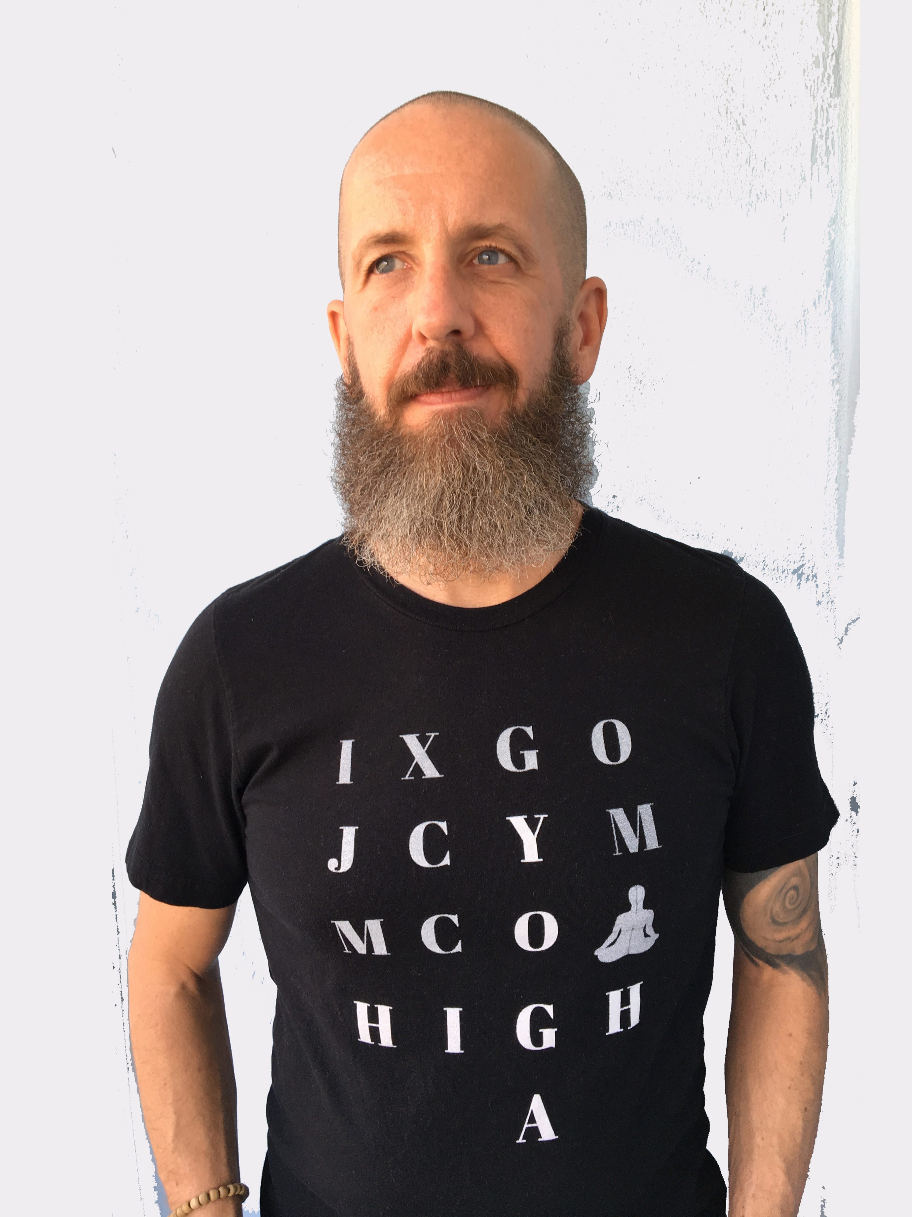 crossword-grey-on-black-t-shirt-a-bearded-yogi-in-loving-memory-of-james-connelly-cropped-part-I